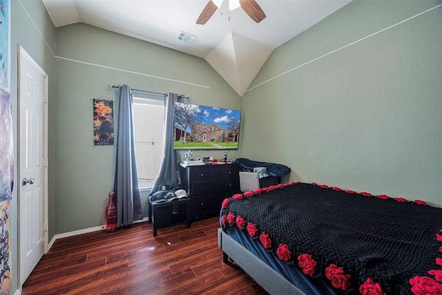 bedroom featuring lofted ceiling, ceiling fan, and dark hardwood / wood-style floors