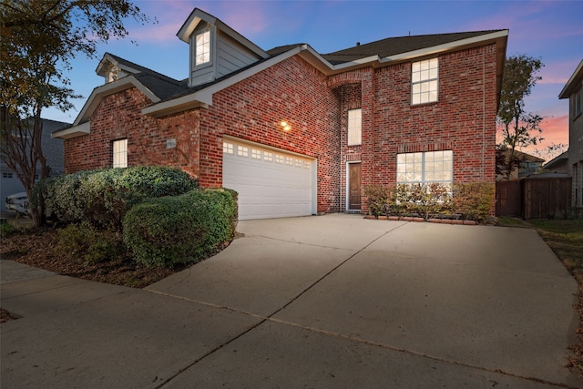 view of property with a garage