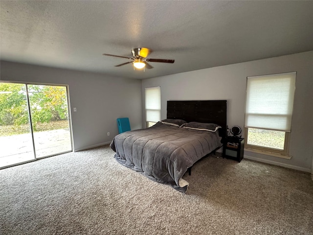 bedroom with carpet flooring, a textured ceiling, access to outside, and ceiling fan