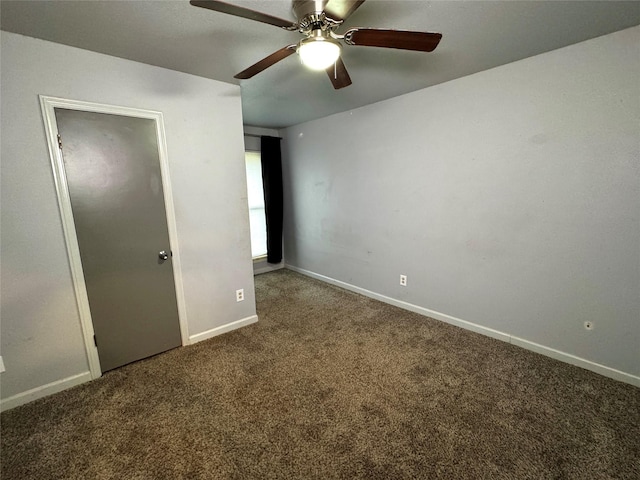 unfurnished bedroom with ceiling fan and carpet floors