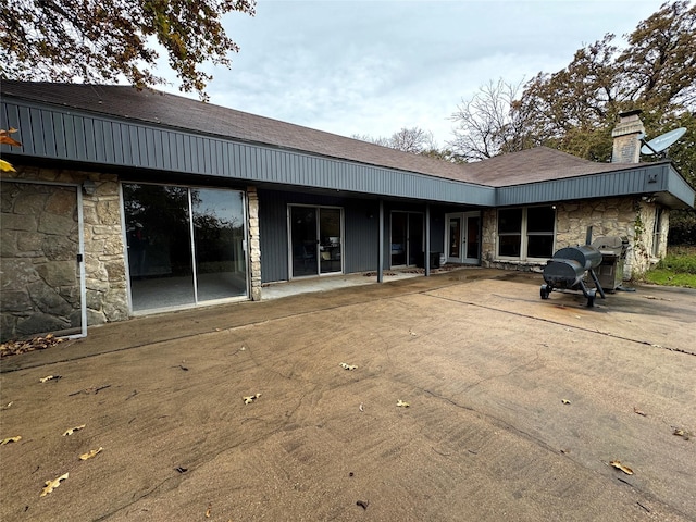 rear view of house with a patio area