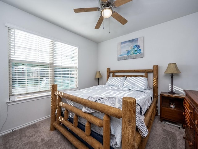 bedroom featuring ceiling fan and carpet flooring