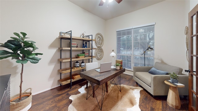 home office with dark hardwood / wood-style floors and ceiling fan