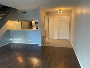 interior space featuring dark wood-type flooring