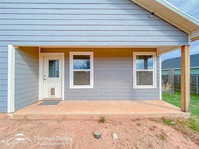 doorway to property featuring a patio area