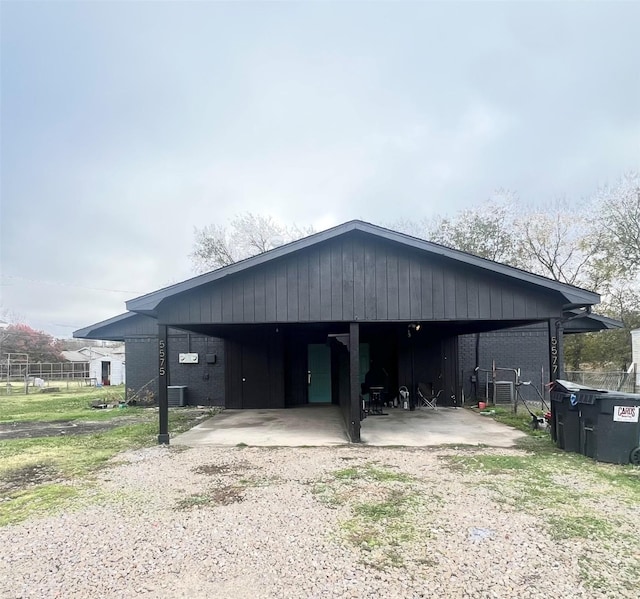 view of outbuilding with a carport