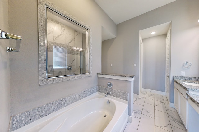 bathroom featuring plus walk in shower and vanity