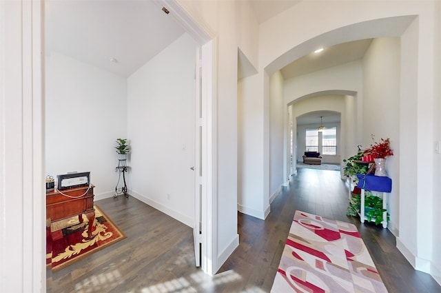 hall featuring dark wood-type flooring