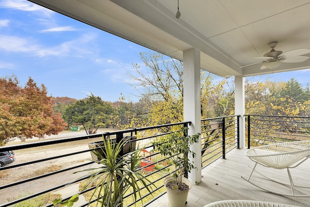 balcony featuring ceiling fan