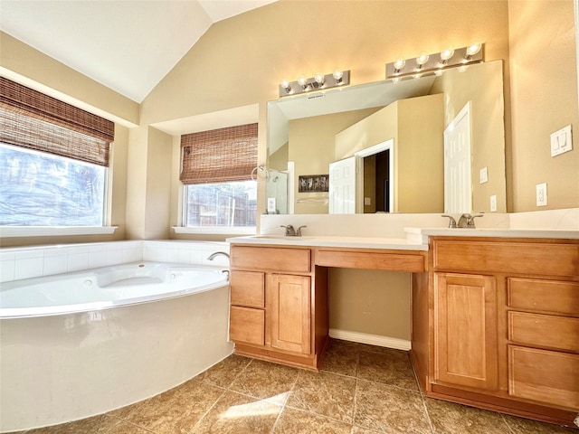 bathroom with separate shower and tub, tile patterned flooring, vanity, and vaulted ceiling