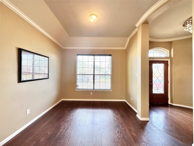 foyer with crown molding and dark wood-type flooring