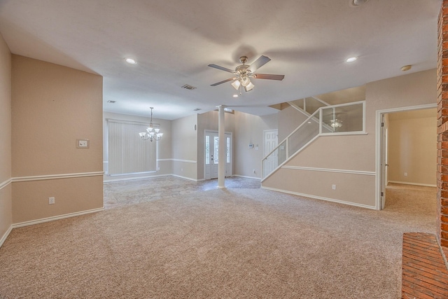 unfurnished room with ceiling fan with notable chandelier and light carpet