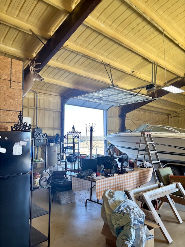 garage featuring black fridge