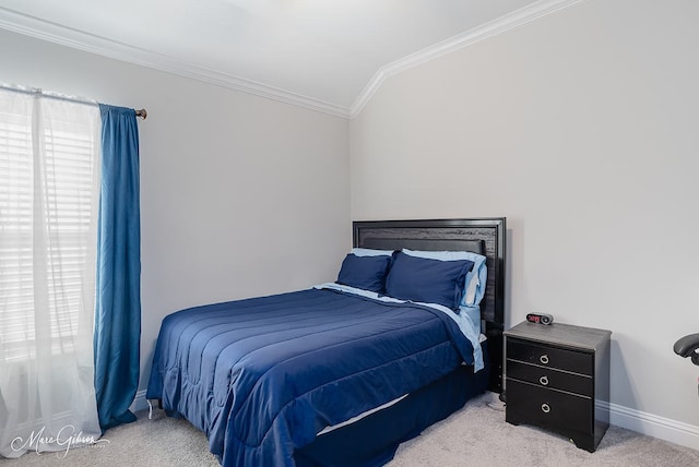 carpeted bedroom featuring vaulted ceiling and crown molding