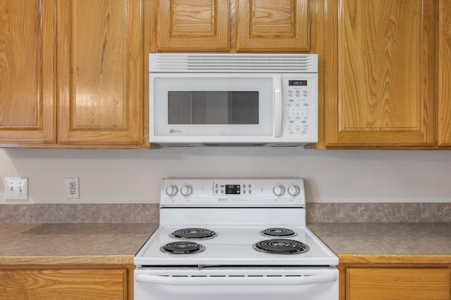 kitchen featuring white appliances