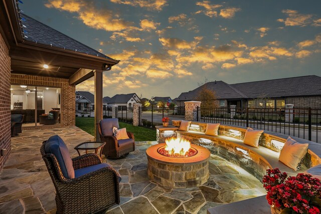 exterior entry at dusk with covered porch