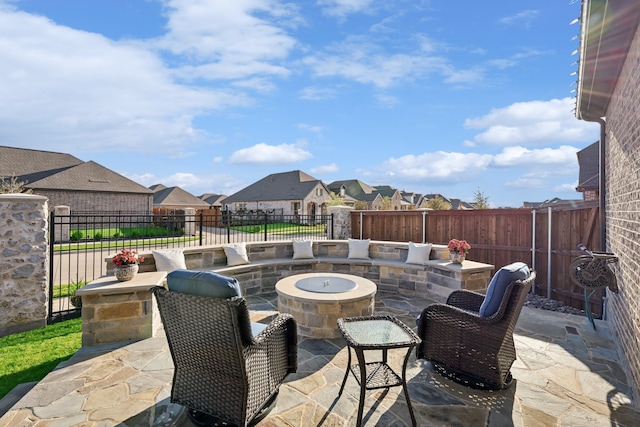 view of patio featuring a fire pit