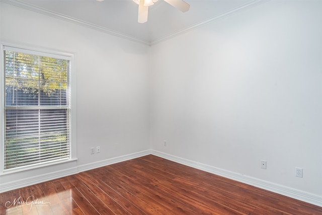 spare room with hardwood / wood-style flooring, ceiling fan, and crown molding