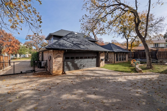 view of side of property featuring a garage