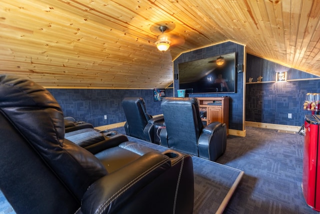 carpeted cinema room featuring vaulted ceiling and wooden ceiling