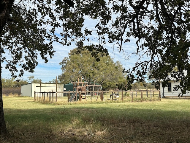 view of yard with a playground