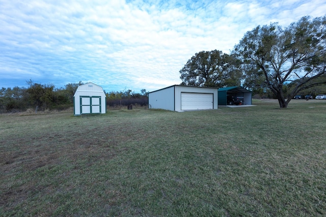 view of yard featuring a carport and a storage shed