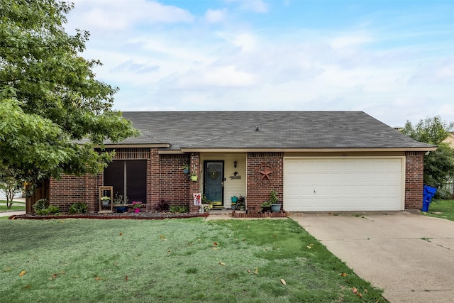 ranch-style home featuring a front yard and a garage