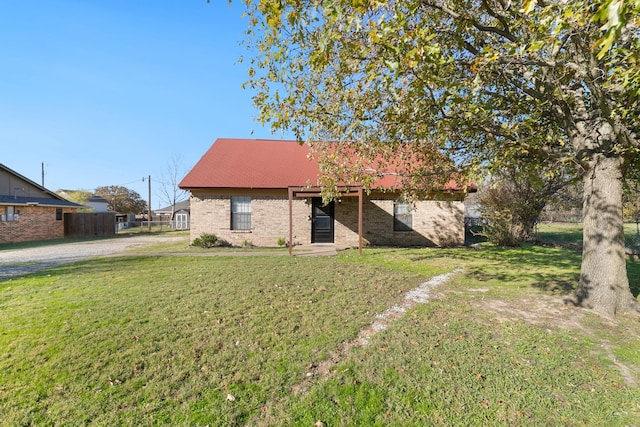 view of front facade with a front lawn