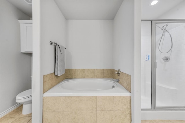 bathroom featuring tile patterned floors, separate shower and tub, and toilet