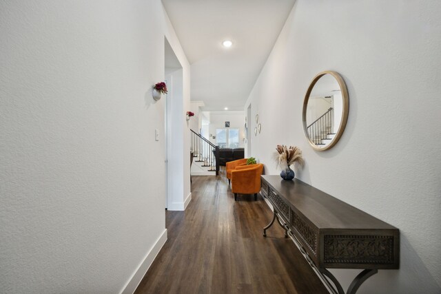 corridor featuring dark wood-type flooring