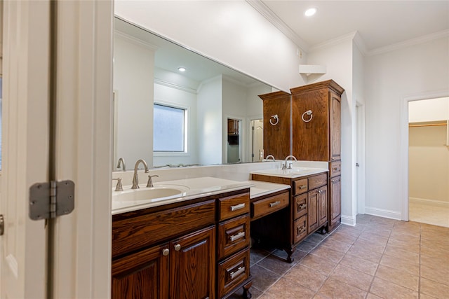 bathroom with crown molding, vanity, and tile patterned flooring