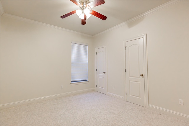 unfurnished bedroom featuring light carpet, ornamental molding, and ceiling fan