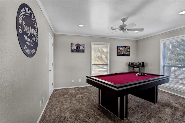 game room with crown molding, billiards, ceiling fan, dark colored carpet, and a textured ceiling