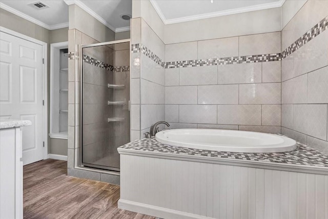 bathroom with vanity, hardwood / wood-style floors, ornamental molding, and independent shower and bath