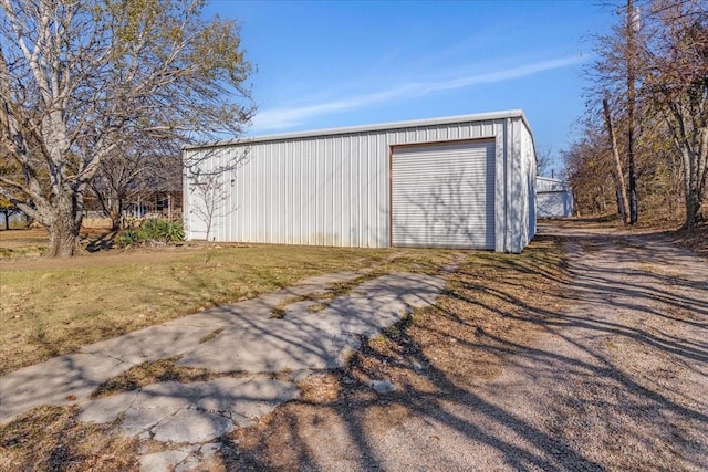 garage with a yard