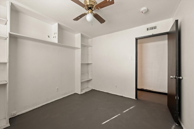 unfurnished bedroom featuring ceiling fan