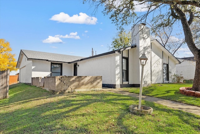 exterior space featuring a lawn