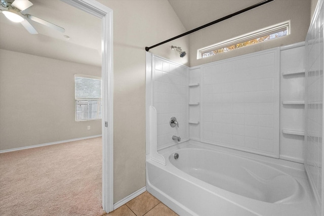 bathroom with tile patterned flooring, shower / tub combination, and ceiling fan