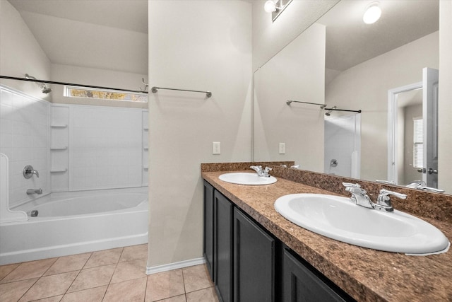 bathroom featuring vanity, tile patterned floors, and  shower combination