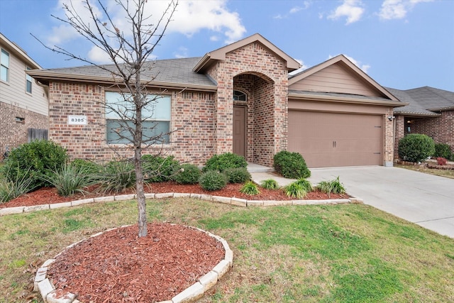 ranch-style home with a garage