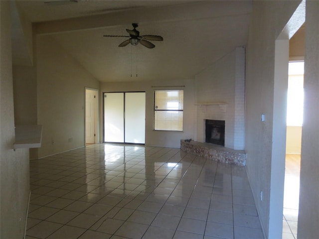 unfurnished living room featuring ceiling fan, a brick fireplace, beamed ceiling, high vaulted ceiling, and light tile patterned flooring