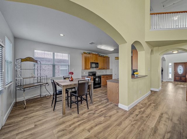 dining area featuring light hardwood / wood-style flooring