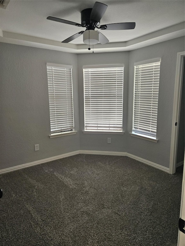 unfurnished room featuring carpet flooring and ceiling fan