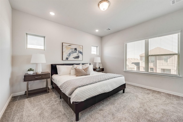 4557 Ward St, North Richland Hills, TX 76180 - carpeted bedroom featuring recessed lighting, baseboards, multiple windows, and visible vents