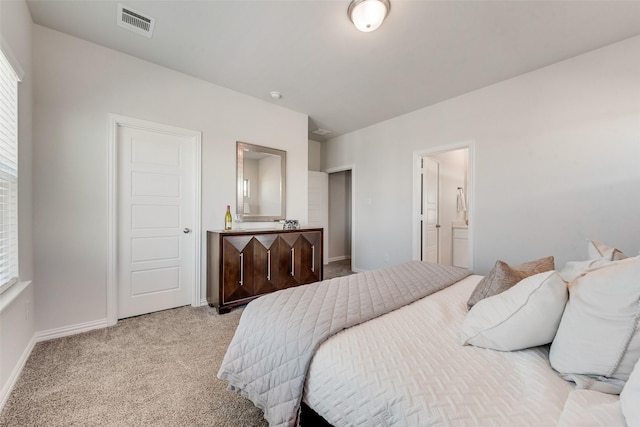 4557 Ward St, North Richland Hills, TX 76180 - bedroom with light colored carpet, visible vents, multiple windows, and baseboards