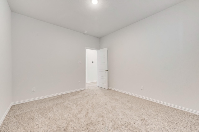 4557 Ward St, North Richland Hills, TX 76180 - unfurnished room with baseboards and light carpet