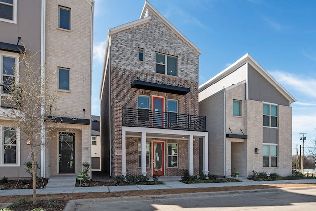 view of front of property featuring brick siding