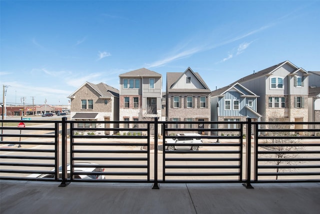 4557 Ward St, North Richland Hills, TX 76180 - view of front of home featuring a balcony and a residential view