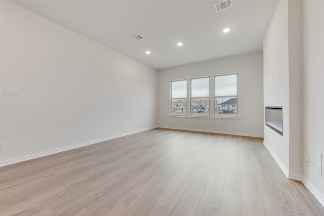 empty room featuring light hardwood / wood-style floors