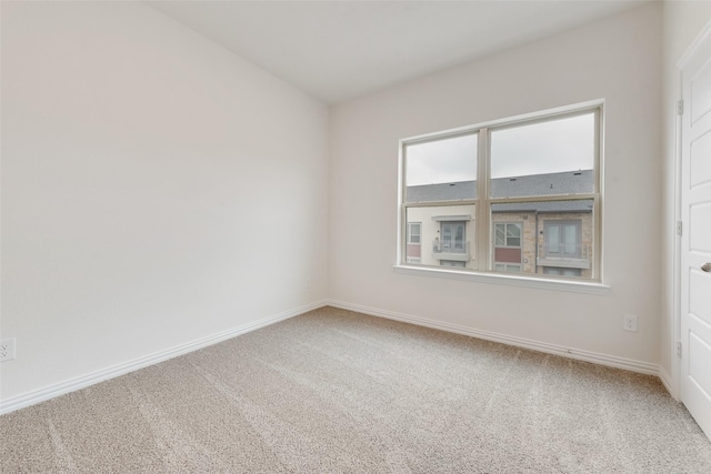 unfurnished room with carpet floors